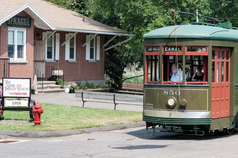 Historic trolley beside the Shore Line Trolley Museum