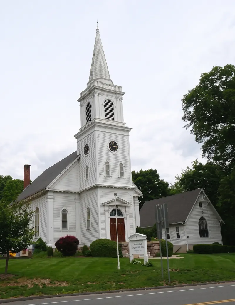 White church with a tall steeple in North Branford, Connecticut
