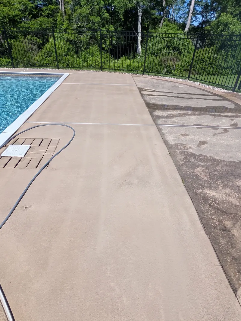 Cleaned and uncleaned sections of a concrete pool deck in Madison, Connecticut