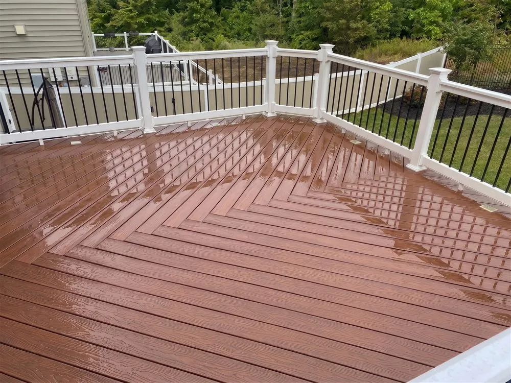 Freshly washed deck with white railings in Guilford, Connecticut