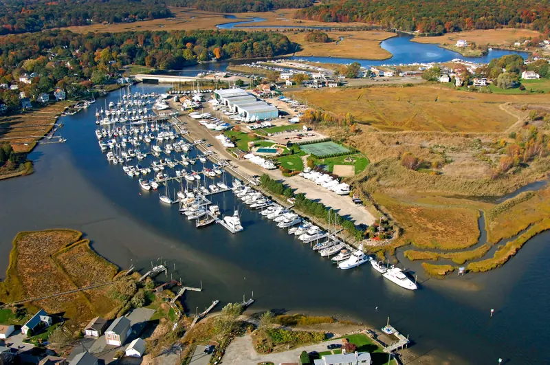 Aerial view of boats and marshland around Westbrook harbor